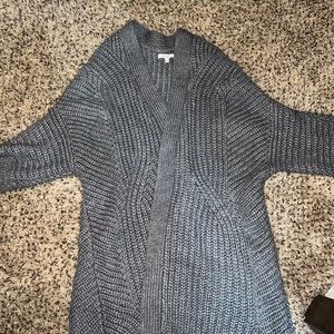Super cute grey sweater, great condition. Worn once